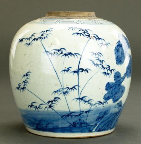 ANTIQUE CHINESE BLUE & WHITE GINGER JAR: With blue underglazed painting of a continuous scene of cherry blossoms, a pine tree, and bamboo shoots. Key fret pattern around the mouth rim. 19th century. H: 8 3/8 in.