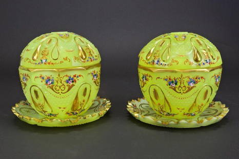 PAIR OF IMPERIAL YELLOW CUT GLASS BONBONIERES: Bohemian; of opaline glass, made for the Islamic Persian and Turkish markets. With imperial yellow color and painted with enamel flowers on the lid, body and the tray. On matching foliate rim cut glas