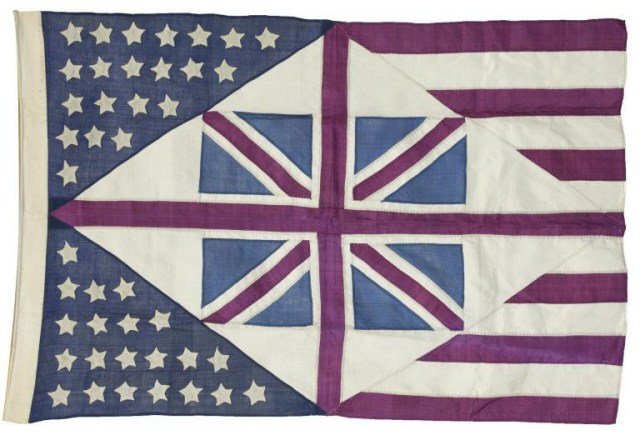 SMALL ANTIQUE AMERICAN FLAG: With British flag in center and with forty two stars in total. H: 22 1/2 in., L: 34 in.