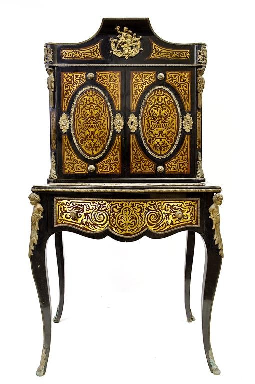 19TH CENTURY ANTIQUE FRENCH WOODEN SECRETARY DESK: Heavily gilt bronze with scrolling inlaid design allover. With two drawers at the front. H: 59 1/4 in., L: 31 in., W: 19 1/2 in.