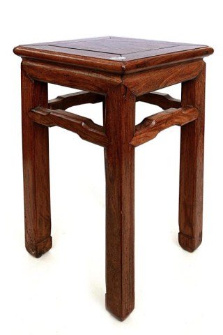 ANTIQUE CHINESE CARVED WOODEN STAND: With humpback stretchers. On four legs, each terminating on a hoof foot. From the Estate of Mr. James Hawkins of California. L: 11 in. (28cm) x W: 11 in. (28cm) x H: 20 1/2 in. (52cm)