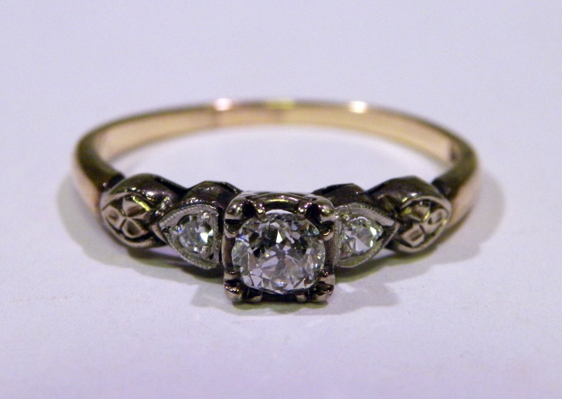 Antique Gold & OMC Diamond Ring: Antique 14k yellow gold engagement ring having an approx.. .25ct. Old Miner cut diamond of VS2 clarity and H color, flanked by .02ct twt single cut diamonds. size 7 1/2, total weight 2.1g