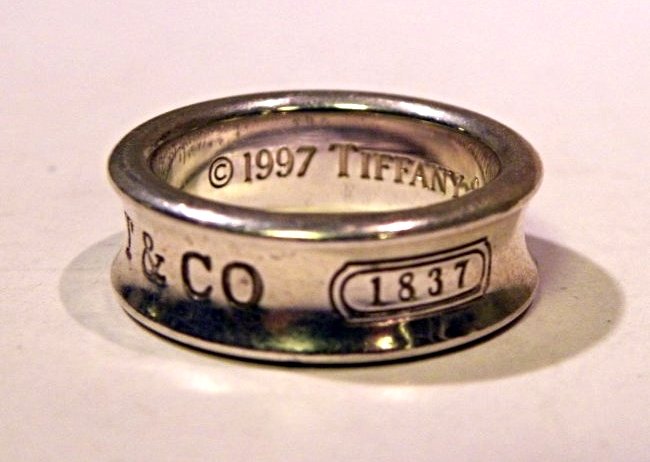 Tiffany & Co. ring: S.S. T & Co. ring size 5 1/2. weight is 7.2g