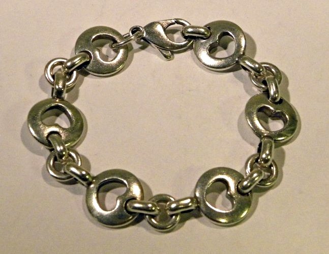 Tiffany & Co. Bracelet: Sterling Silver Tiffany & Co. Stencil Heart Chain Link Bracelet; total weight 29.3g; total length approx. 7"