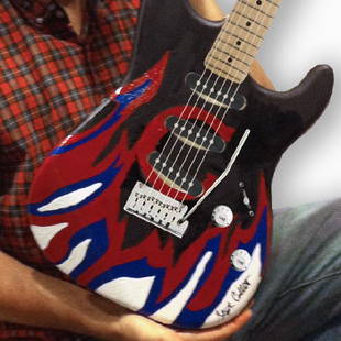 Stephen Colbert: Stephen Colbert is an American political satirist, writer, comedian and television host of Comedy Central's "The Colbert Report." A guitar player himself, Colbert painted this red, white and blue