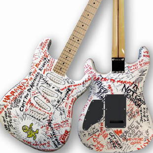 James Hetfield: Metallica frontman James Hetfield's guitar features a happy, thriving, yellow rocker who is unaffected by the storm of negativity that surrounds him. This confidence in the face of adversity is the