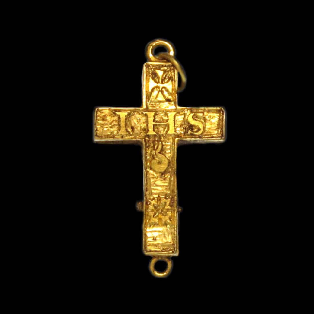 Very Fine Medieval Engraved Reliquary Gold Cross: Very Fine Medieval Engraved Reliquary Gold Cross, France 13th Century A.D. Hollow gold cross decorated on one side with a cross, a rosette and in the centre ñIHSî (Jesus), the other side with a cent