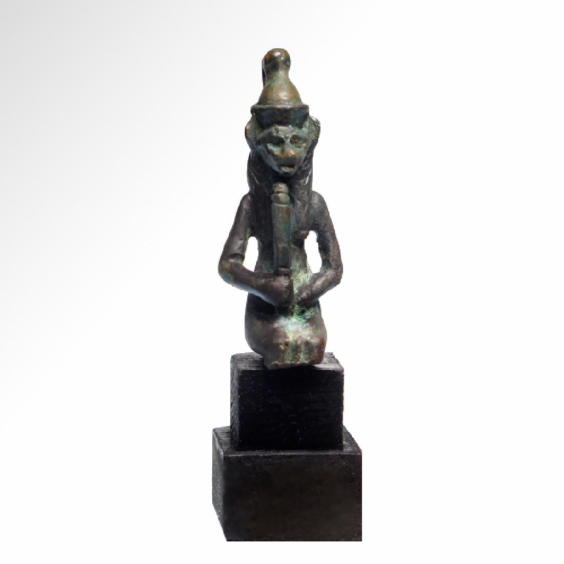 Egyptian Bronze Lioness Sekhmet, c. 500 B.C.: Egyptian Bronze Lioness Sekhmet, c. 500 B.C. Seated godess Sekhmet, holding the sacred rattle in her right hand. Sekhmet means "The Mighty One," and she was one of the most powerful of the gods and go