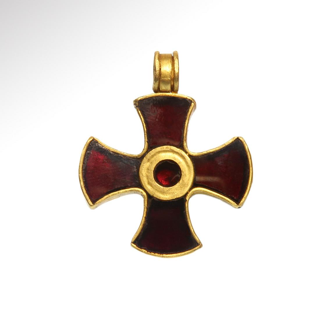 Medieval Saxon Gold and Garnet CloisonnŽ Cross, 7th-9th: Medieval Saxon Gold and Garnet CloisonnŽ Cross, 7th-9th Century A.D. The gold cross with raised sides set in cloisonnŽ with garnets, the centre with round recess and a set round garnet. Size:3.7 cm 