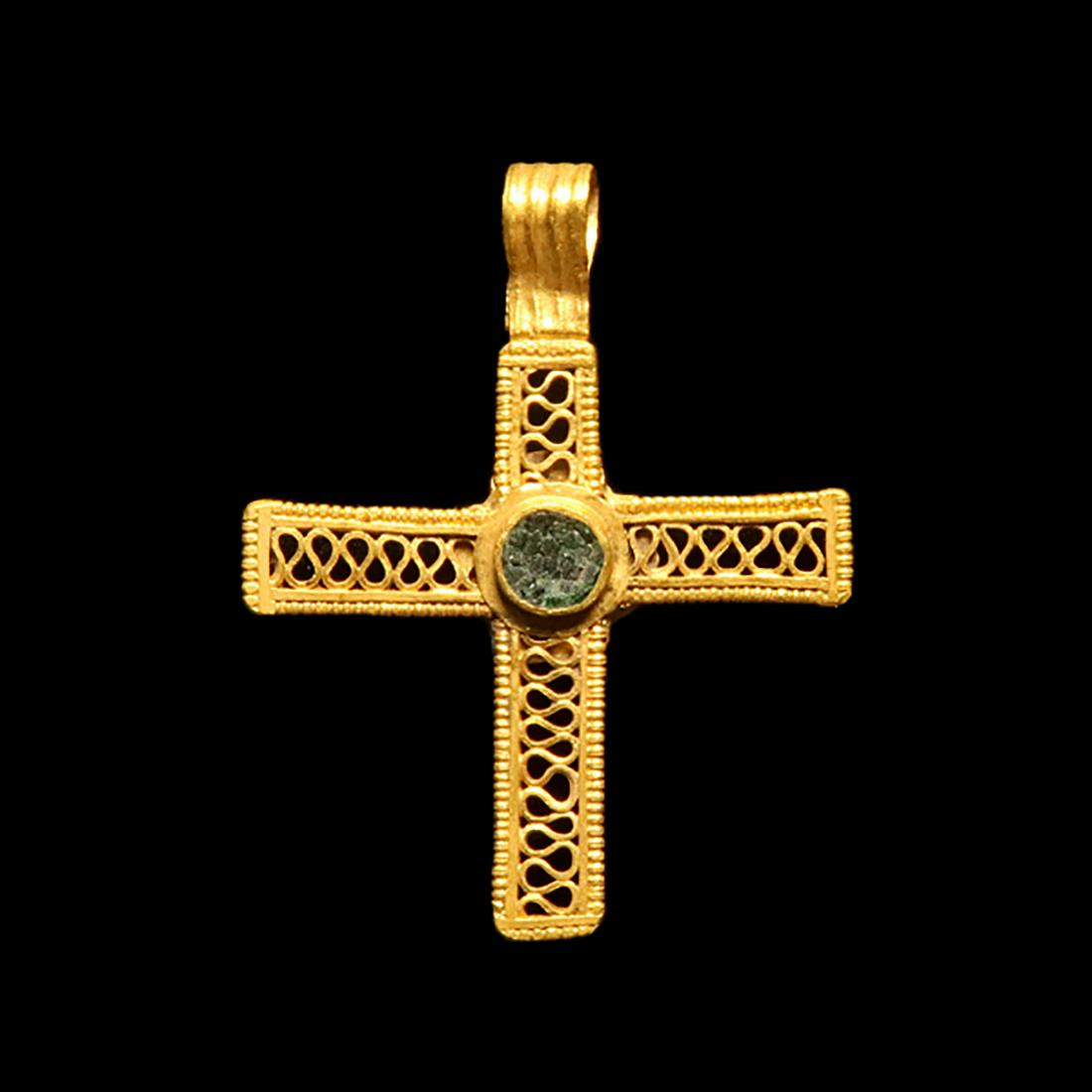 Medieval Gold Openwork Cross, c. 15th Century A.D.: Medieval Gold Openwork Cross, c. 15th Century A.D. A gold open-work cross pendant with beaded wire edges, meander-pattern filigree fill to each arm, ribbed loop, central cell with green glass (?) cloi