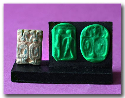 Egyptian Faience Plaque with Cartouches, .: Egyptian Faience Plaque with Cartouches, 19th Dynasty, Ramesside, c. 1250 B.C. Engraved with the standing figure facing the hieroglyphs "Re" and "truth", the front with double cartouche wit with, a se