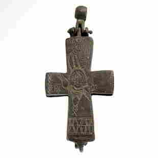 Byzantine Bronze Reliquary Cross Pendant with Saints and Jesus, c. 10th - 12th century A.D.: Byzantine Bronze Reliquary Cross Pendant with Saints and Jesus, c. 10th - 12th century A.D.Bronze enkolpion reliquary cross pendant comprising two hinged plates and an articulated suspension loop with