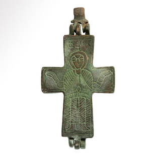 Byzantine Bronze Reliquary Cross Pendant with Saint and Jesus, c. 10th - 12th century A.D.: Byzantine Bronze Reliquary Cross Pendant with Saint and Jesus, c. 10th - 12th century A.D.Bronze enkolpion reliquary cross pendant comprising two hinged plates and an articulated suspension loop with
