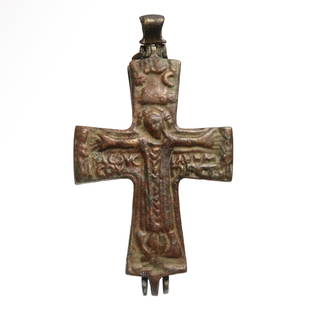 Byzantine Bronze Large Reliquary Inscribed Cross, c. 10th century A.D.: Byzantine Bronze Large Reliquary Inscribed Cross, c. 10th century A.D.One side with engraved figure of Christ in high relief and inscriptions. Size:11.8 cm L - 4 5/8 inches Material:Bronze Culture:Byz