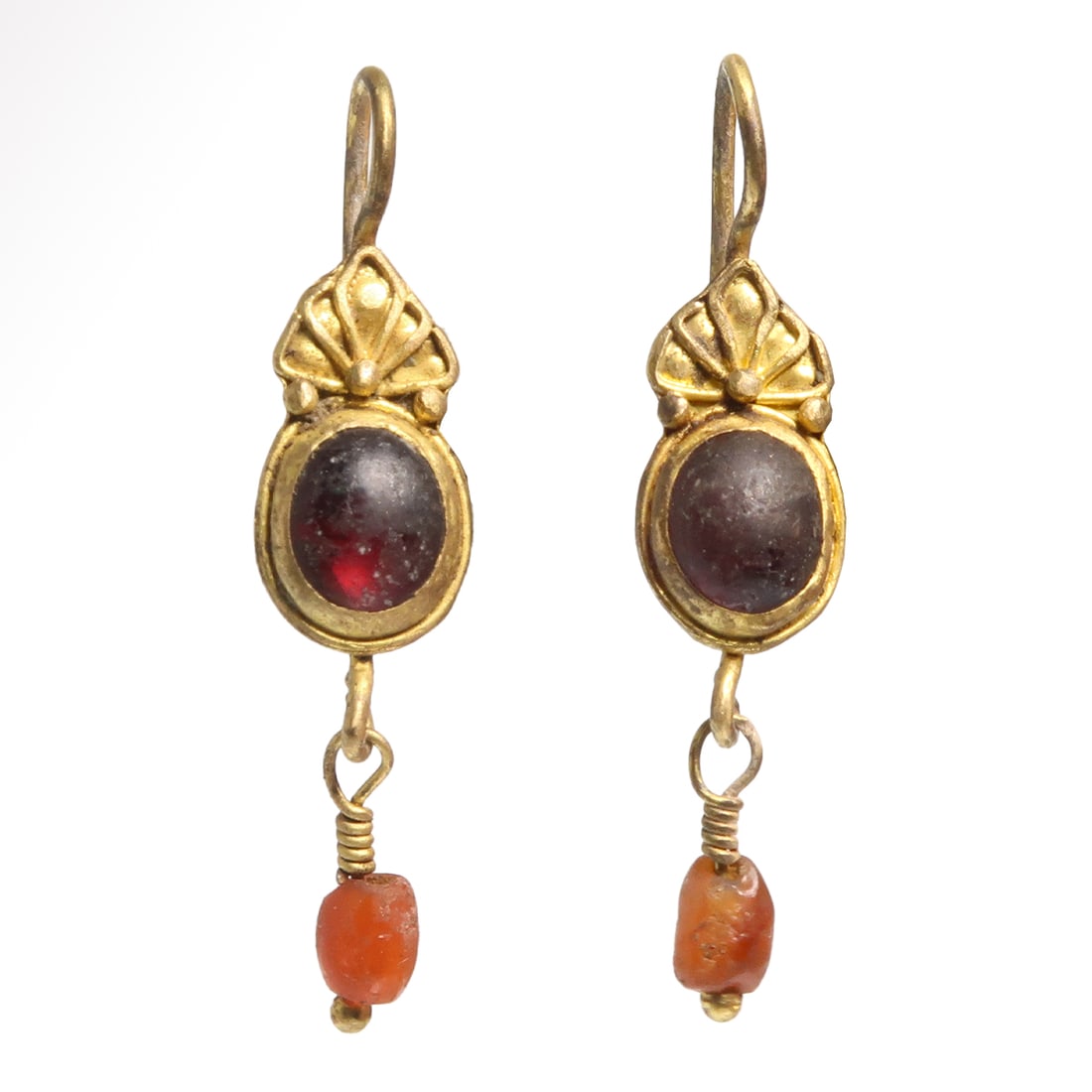 Roman Gold, Cornelian and Garnet Earrings, c. 1st-2nd Century A.D.: Roman Gold, Cornelian and Garnet Earrings, c. 1st-2nd Century A.D. Oval shaped bezel set with a garnet and surmounted by a rosette, a gold pendant with cornelian bead at the bottom. Size:3.6 cm L - 1 