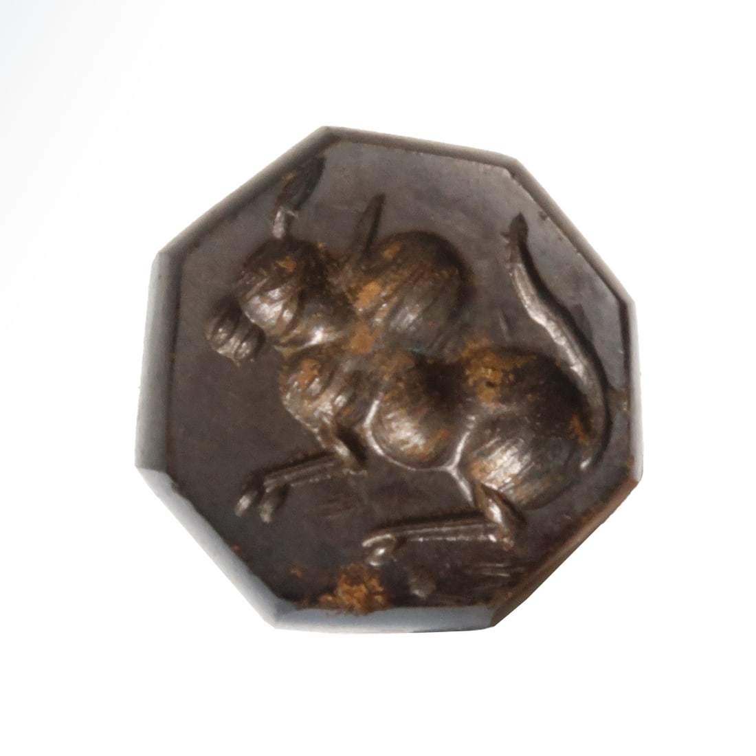 Sassanian Dome Hematite Seal with Bull, c. 3rd - 4th Century A.D.: Sassanian Dome Hematite Seal with Bull, c. 3rd - 4th Century A.D.Deeply carved with a bull, with octagonal face and a tall domed back, pierced for suspension. Size:2.4 cm L - 15/16 inch Material:Hemat