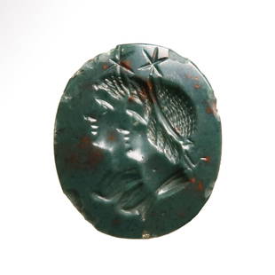 Roman Green Jasper Intaglio with Dioscuri, Castor and Pollux, c. 1st - 2nd Century A.D.: Roman Green Jasper Intaglio with Dioscuri, Castor and Pollux, c. 1st - 2nd Century A.D.Of green garnet, finely engraved with the profile busts of the Dioscuri Castor and Pollux, standing side by side,