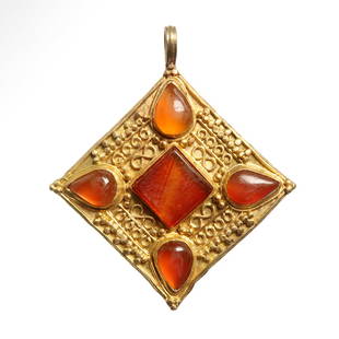 Roman Gold and Cornelian Pendant, c. 2nd-4th Century A.D.: Roman Gold and Cornelian Pendant, c. 2nd-4th Century A.D.Gold square pendant of very fine filigree work and granules fillers. The centre set with a large square cornelian cabochon stone surrounded by