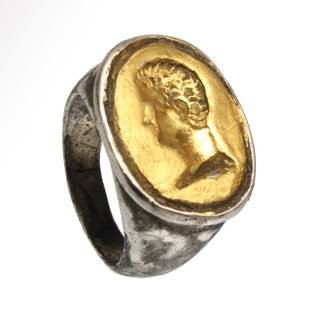 Roman Solid Silver Ring with Gold Intaglio, Bust of a Man, c. 1st - 2nd Century A.D.: Roman Solid Silver Ring with Gold Intaglio, Bust of a Man, c. 1st - 2nd Century A.D.Solid silver ring, shank with widening shoulders, set with oval gold intaglio deeply engraved with the bust of a man