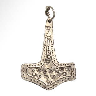 Viking Solid Silver “Hammer of Thor?? or Mjölnir Pendant,  c. 11th Century A.D.: Viking Solid Silver “Hammer of Thor&rdquo; or Mjölnir Pendant, c. 11th Century A.D.Thor hammer or Mjölnir, made of silver and decorated with typical square and round punching as well as fine dots