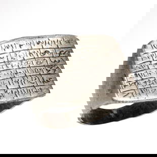 Medieval Talismanic Silver Ring with Magical Protective Formula in Numbers, c. 17th Century A.D.: Medieval Talismanic Silver Ring with Magical Protective Formula in Numbers, c. 17th Century A.D.The rectangular bezel deeply engraved with a grid of 36 squares, each inscribed with letters and