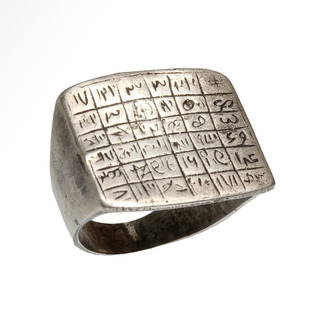 Medieval Talismanic Silver Ring with Magical Protective Formula in Numbers, c. 17th Century A.D.: Medieval Talismanic Silver Ring with Magical Protective Formula in Numbers, c. 17th Century A.D.The rectangular bezel deeply engraved with a grid of 36 squares, each inscribed with letters and symbols