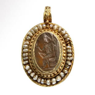 Roman, Gold and Pearls Pendant with Cornelian Intaglio, c. 2nd Century A.D.: Roman Gold and Mother of Pearl Pendant with Cornelian Intaglio, c. 2nd Century A.D.The centre set with an oval cornelian intaglio engraved with the figure of man seated on a throne, holding a mirror i