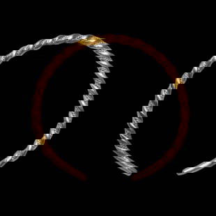 Viking Gold Bracelet, c. 9th Century A.D.: Viking Gold Bracelet, c. 9th Century A.D.Made of double thick gold wires, twisted together with a rope patterned wire in between, all wires merging together into plain gold terminals.Size:6.4 cm
