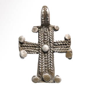 Byzantine Silver Cross, c. 8th-10th Century A.D.: Byzantine Silver Cross, c. 8th-10th Century A.D.The front with wire rope pattern and beading decoration, large suspension loop at the top.Size:4.3 cm L (including loop) - 1 5/8 inch Material:Silver,