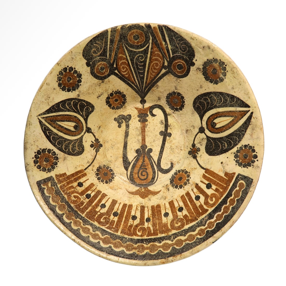 Bamyan Glazed Pottery Bowl, c. 10th Century A.D.: Bamyan Glazed Pottery Bowl, c. 10th Century A.D. On a short circular foot, cream ground and nicely decorated with a central stylized jug surrounded by floral decor, below a band of stylized Kufic repe