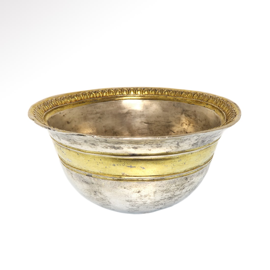 Greek Silver Gilt Beaker, c. 5th - 3rd century B.C.: Greek Silver Gilt Beaker, c. 5th - 3rd century B.C. Parcel-gilt silver palm cup with hemispherical bowl, flared rim, gilt band to the outer face with framing ribs, rim with egg-and-dart detailing. Siz