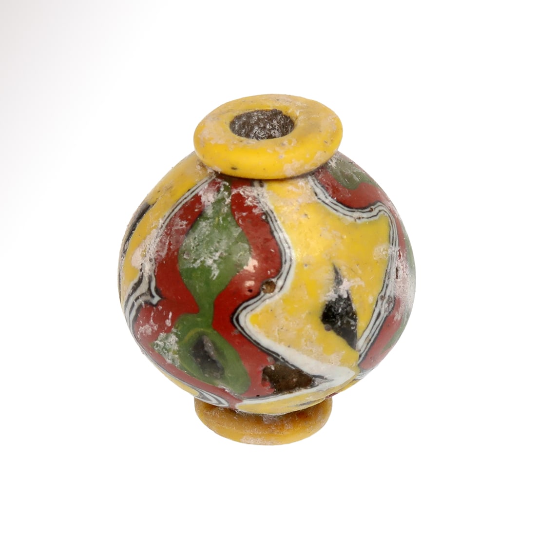 Near Eastern Large Mosaic Glass Bead, c. 5th-6th Century A.D.: Near Eastern Large Mosaic Glass Bead, c. 5th-6th Century A.D.Mosaic bead in a marbled pattern of white, green, red and yellow.Size:3.1 cm H - 1 1/4 inch Material:Glass Culture:East Mediterranean, c. 5