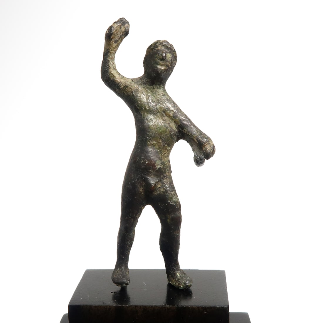 Etruscan Bronze Figure of a Warrior, c. 5th-3rd Century B.C.: Etruscan Bronze Figure of a Warrior, c. 5th-3rd Century B.C.Standing nude, holding dagger in his left hand, his right hand raised to hold a spear (now missing).Size:6.5 cm H - 2 9/16 inches Material:B