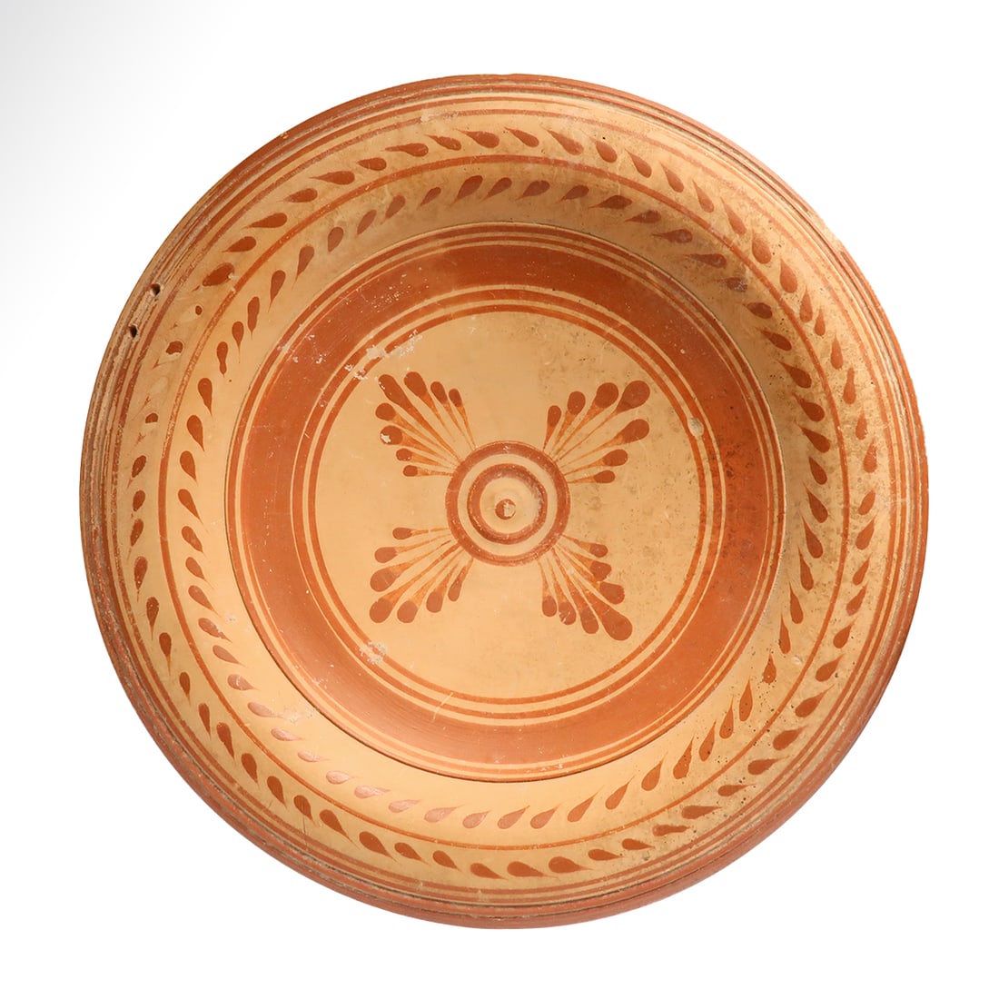 Messapian Pottery Plate, South Italy, c. 4th Century B.C.: Messapian Pottery Plate, South Italy, c. 4th Century B.C.On short round foot, with shallow basin and raised rim. Beautifully decorated in red slip on light background with palmettes, concentric circle