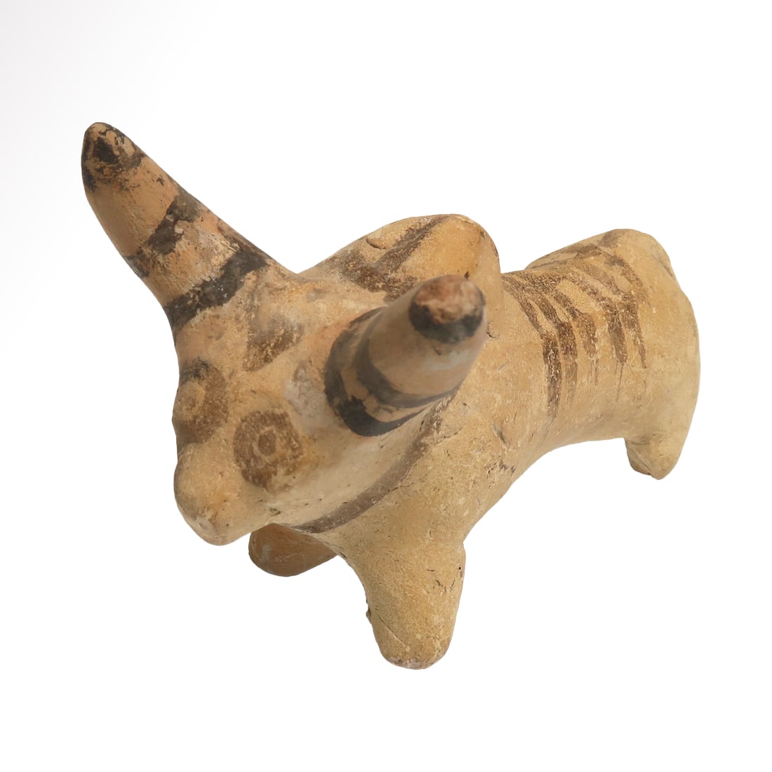 Indus Valley Terracotta Bi-Chrome Zebu Bull, c. 2400-2300 B.C.: Indus Valley Terracotta Bi-Chrome Zebu Bull, c. 2400-2300 B.C.Bichrome terracotta bull with curved horns, curving hump, stripes painted in black over a cream background.Size:8.4 cm L - 3 5/16 inches M