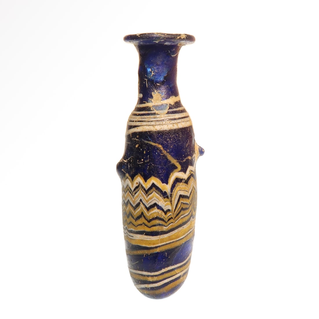 Greek Mosaic Core-formed Alabastron, c. 5th-4th Century B.C.: Greek Mosaic Core-formed Alabastron, 5th-4th Century B.C.Blue body, marvered spiral trailing around the neck and base, opaque yellow, blue and white zig-zag decoration in the middle, two applied handl