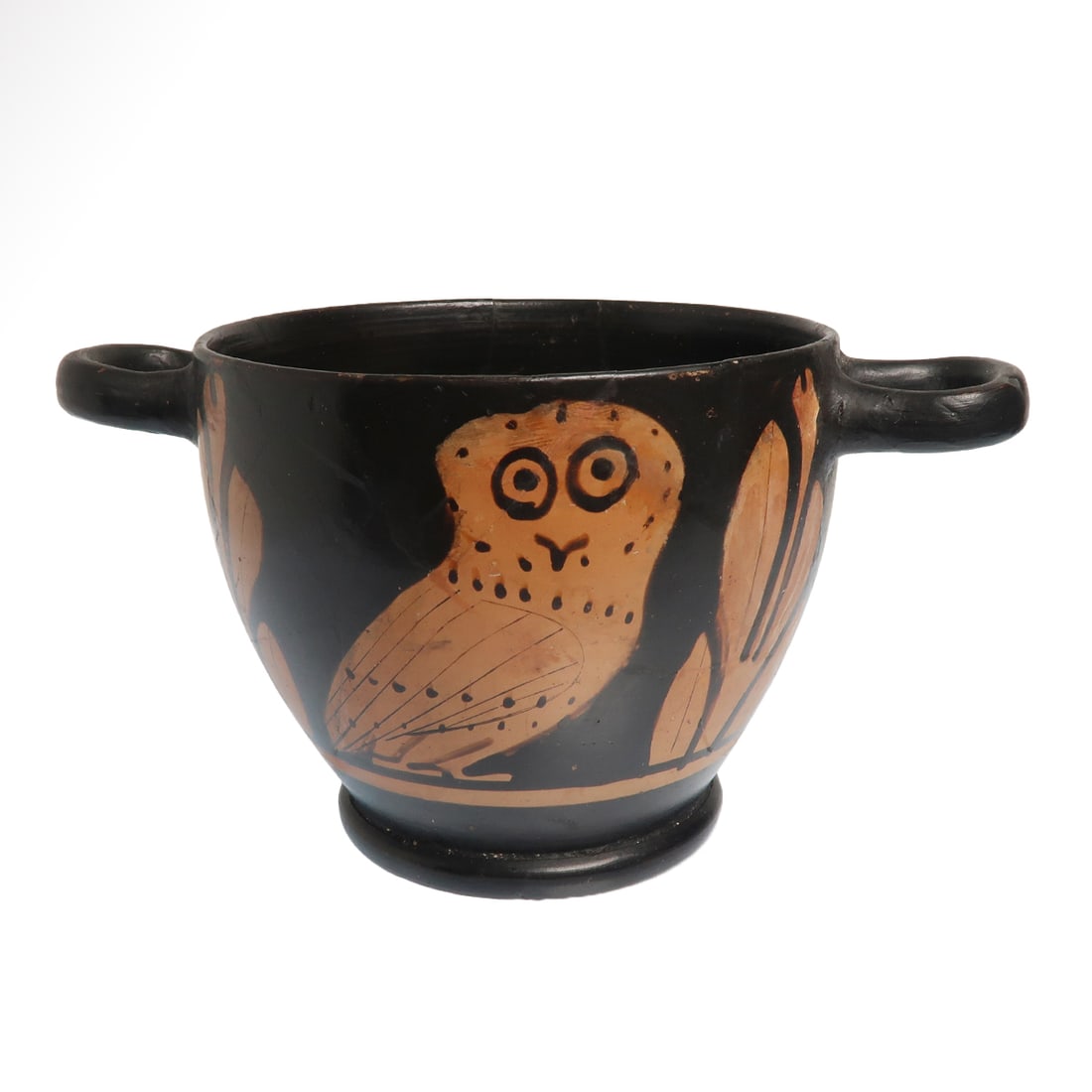 Greek Apulian Red Figure Owl Skyphos, c. 5th-4th Century B.C.: Greek Apulian Red Figure Owl Skyphos, c. 5th-4th Century B.C.Black glazed skyphos with red figure of an owl amid vegetation, two loop handles to the sides. Exquisite.Size:8.3 cm H - 3 1/4 inches - 15.