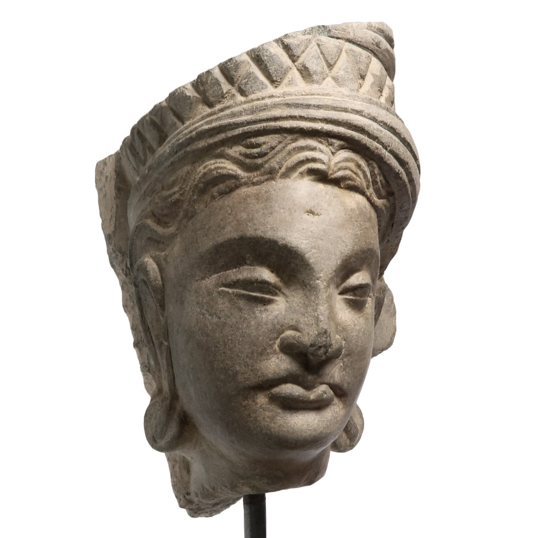 Schist Gandhara Buddha Head, c. 2nd - 3rd Century A.D.: Schist Gandhara Buddha Head, c. 2nd - 3rd Century A.D.Extremely fine facial details, elongated ears, wavy hair with crown on top. The Ghandaran Empire was located in what is now largely occupied by No
