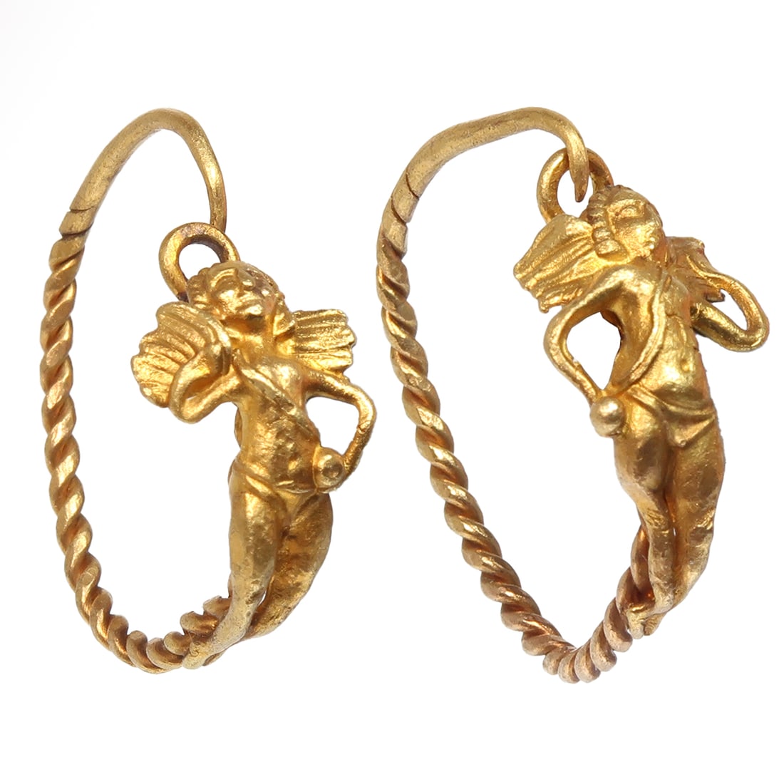 Greco-Roman Gold Earrings with Cupids/Eros, c. 1st Century B.C./1st Century A.D.: Greco-Roman Gold Earrings with Cupids/Eros, c. 1st Century B.C./1st Century A.D. Two figures of winged Eros (Cupid) attached to a twisted tapering loop. Exceptional details. Size:2.3 cm L each - 7/8 i