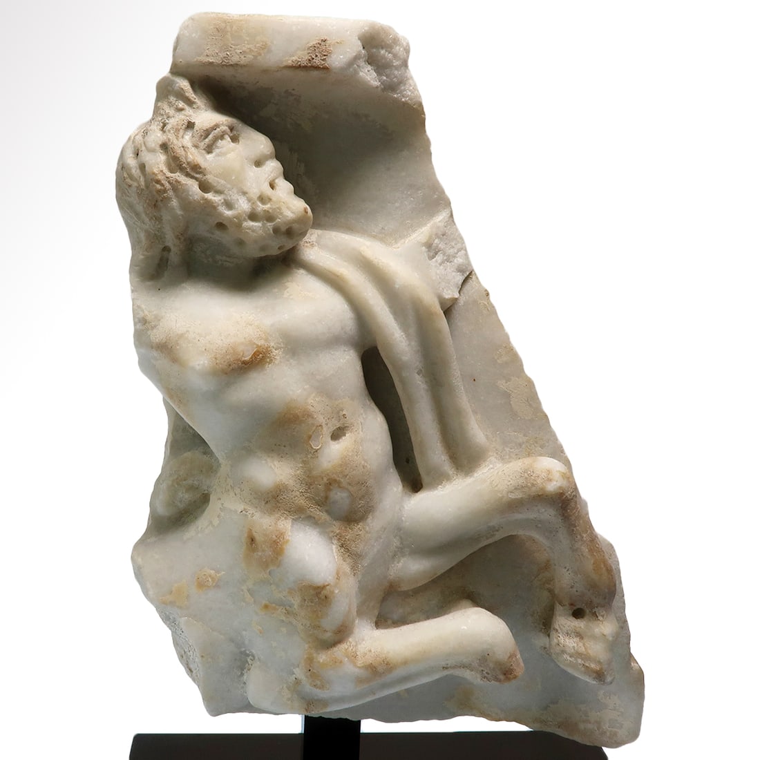 Large Roman Marble Relief with Centaur, c. 2nd-3rd Century A.D.: Large Roman Marble Relief with Centaur, c. 2nd-3rd Century A.D. Rearing centaur in profile, folds of drapery falling over his left shoulder, muscular torso, drilled details of the face, beard and hair