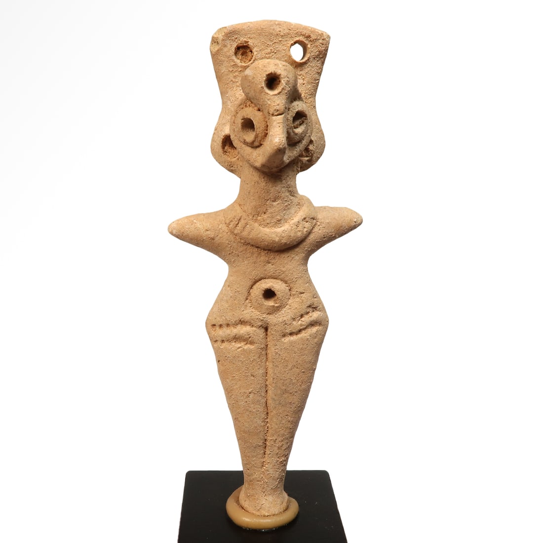 Syro-Hittite Terracotta Fertility Figure, c. 2nd Millennium B.C.: Syro-Hittite Terracotta Fertility Figure, c. 2nd Millennium B.C. Flat-section figurine with elaborate pierced headdress, applied annular eyes and navel, pinched nose, applied segmented collar and poin