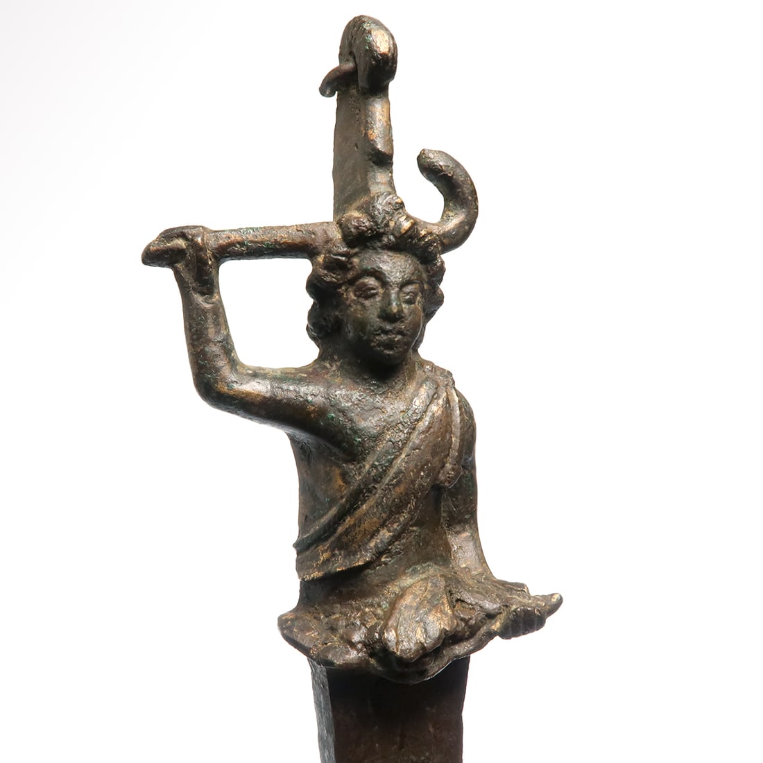 Etruscan Bronze Column Figure with Grapes and Pruning Stick, c. 3rd Century B.C.: Etruscan Bronze Column Figure with Grapes and Pruning Stick, c. 3rd Century B.C. Standing and facing forward, a sash worn diagonally across the torso, his right arm raised holding a pruning hook and h