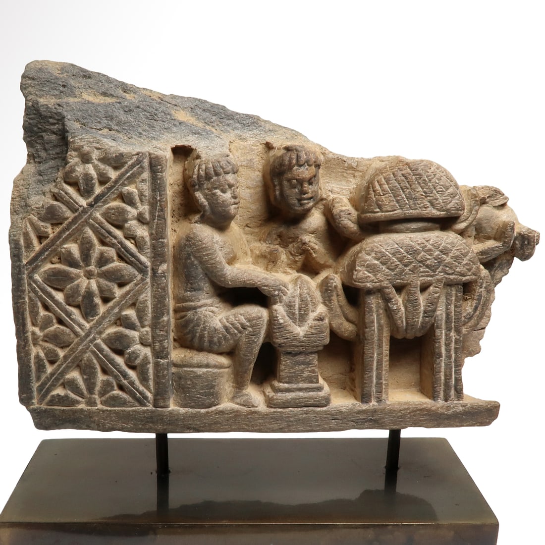 Gandhara Schist Relief, Worshippers and Stuppa, c. 1st Century B.C.: Gandhara Schist Relief, Worshippers and Stuppa, c. 1st Century B.C. Depicting two figures with offering stand sitting in front of a stuppa on columns, a temple wall on the side with flower patterns. S