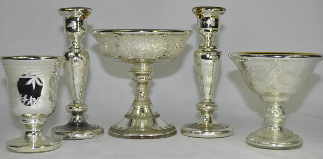 Etched Victorian Two-Toned Mercury Glass: 1) Centerpiece set, comprising a pair of 8 in. candlesticks and a 5.5 in. x 5.5 in. compote, 1) 6.75 in. x 6.75 in. compote, original paper label under foot, 1) 5 in x 3.5 in. vase, very good conditio