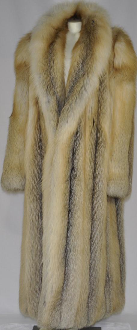 Full Length Natural Canadian Red Fox Coat: Size 16, rolled collar, hook and loop closures, sleeves measuring 30 in. shoulder to cuff, timeless styling, light spotting visible on the lower lining.
