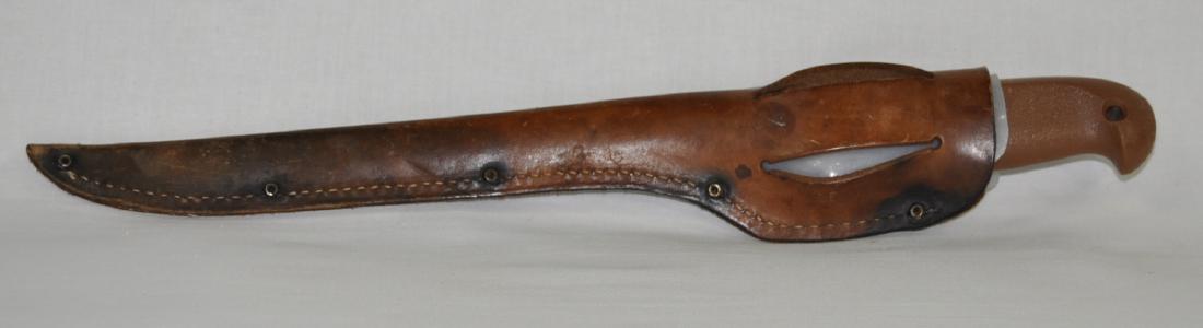 Case 9 in. S. S. Filet Knife & Sheath: Sheath is darkened, knife appears unused or very lightly used.