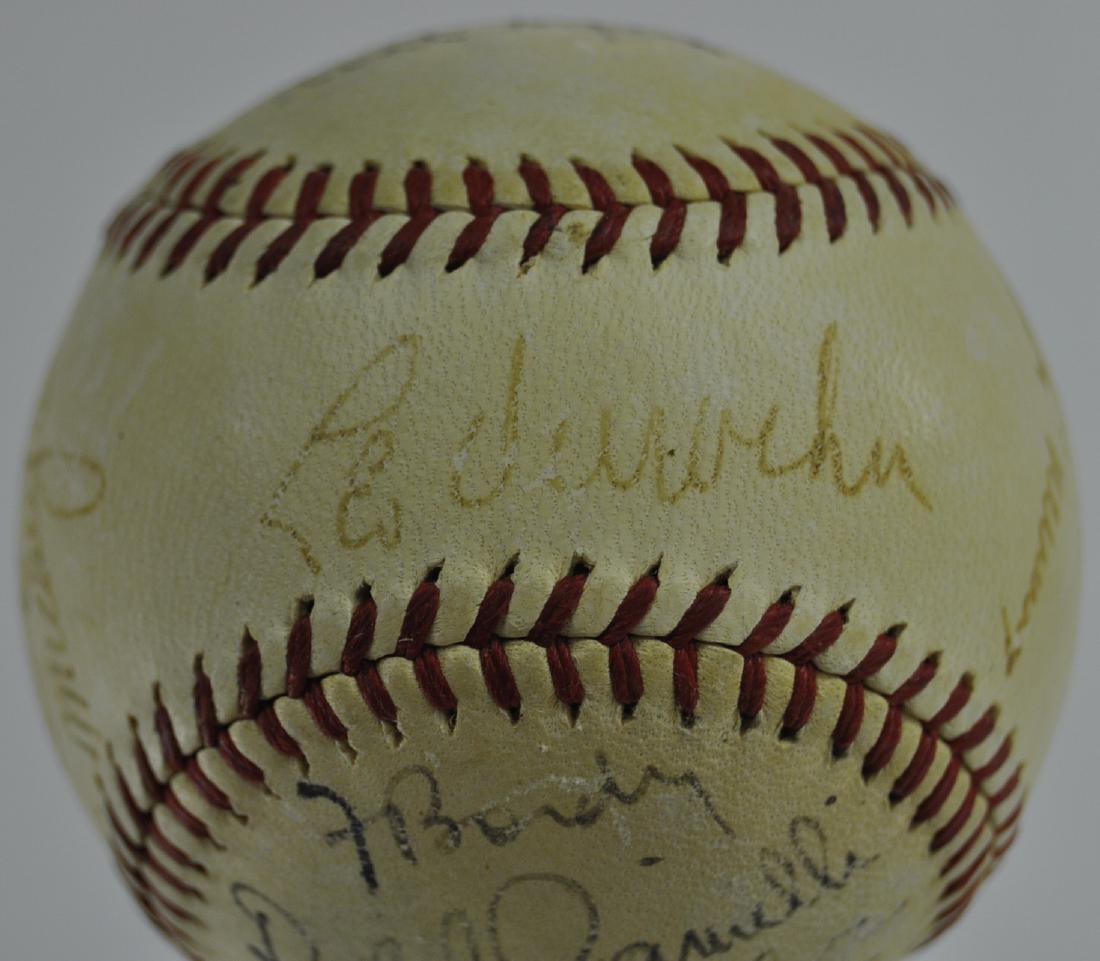 Brooklyn Dodgers Autographed Baseball: Dolph Camilli, Leo Durocher, Augie Galan, Billy Herman, Newt Kimball, Max Macon, Mickey Owen, Pee Wee Reese, Pete Reiser, Johnny Rizzo, Dixie Walker, more. Faint but legible.