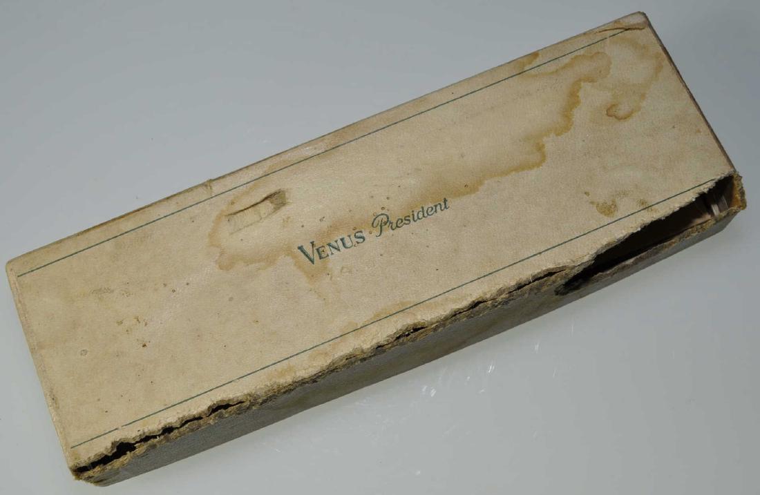 Vintage Venus President Writing Set: Blue-gray and silver pearlized stripes. Lever fill fountain pen, disintegrated sac, Venus 14k Fine nib, good tipping material, 5 1/4 in. Mechanical pencil, 5 in. Set in fair condition.