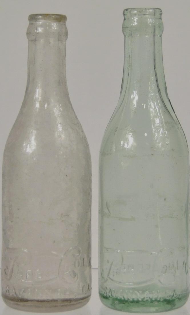 2) Rare Savannah, Georgia Pepsi Cola Bottles: 8 in., Straight sided, script logo, one colorless, one aqua, both have case wear, no large chips, no cracks.