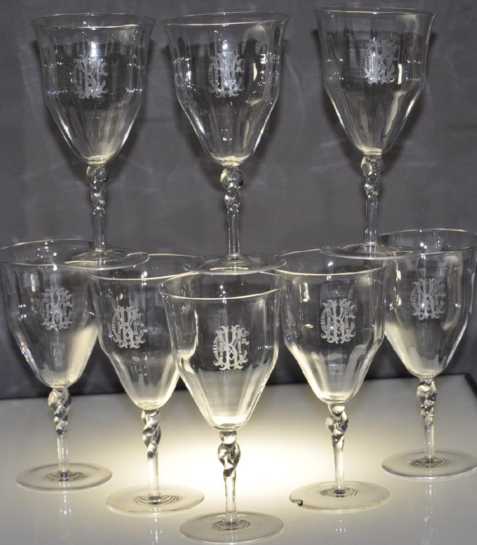 8) Mid-Victorian Crystal Wine Glasses: Mouth formed with polished pontils, plain feet, twisted stems and paneled cups deeply engraved with the stacked initials K M C, with the "K" appearing to be foremost. Measuring 6.5 in. x 3.25 in., the